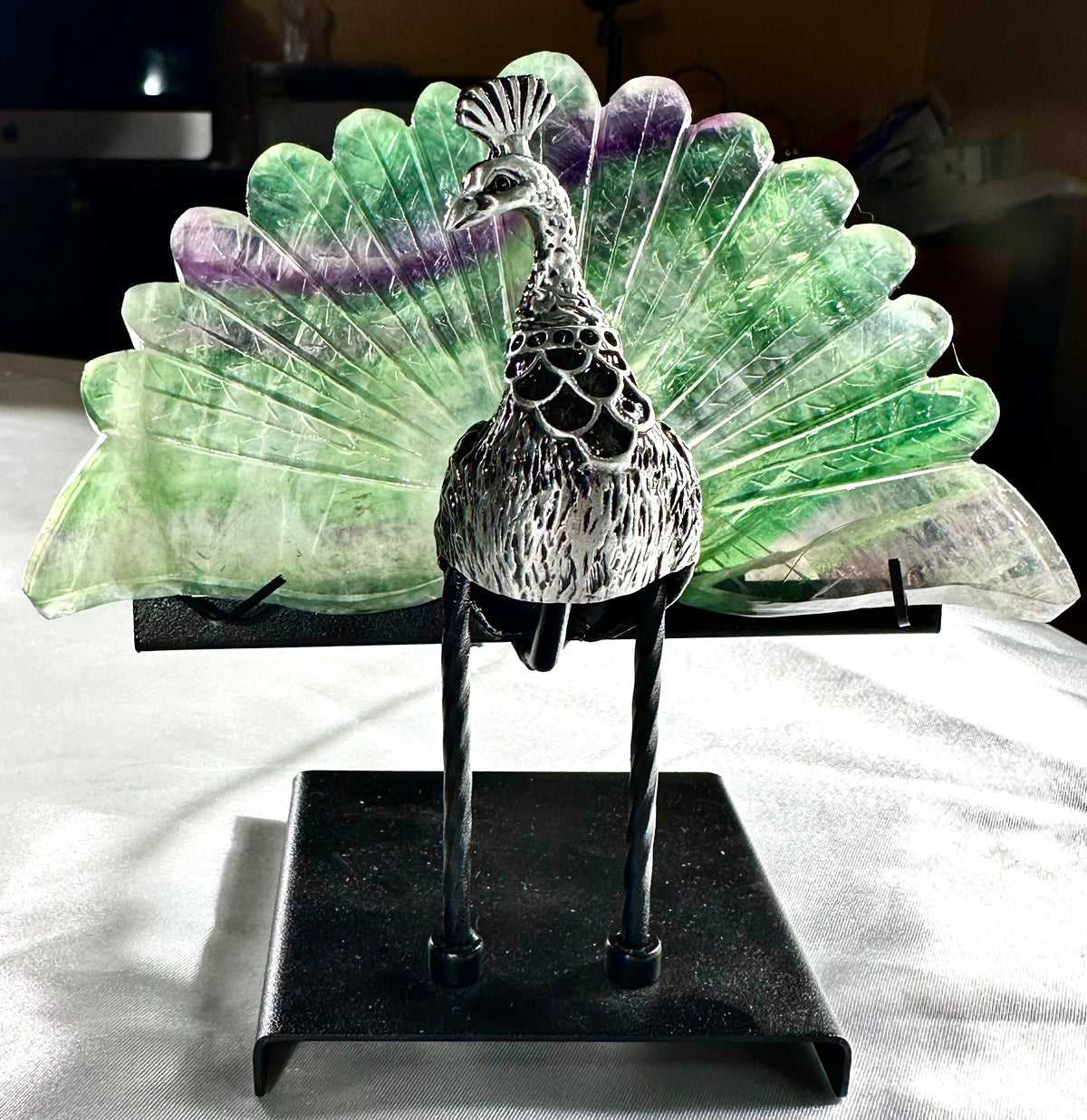 Peacock in fluorite on stand