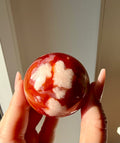 Sfera in agata sakura ed agata corniola