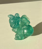 Ape in fluorite