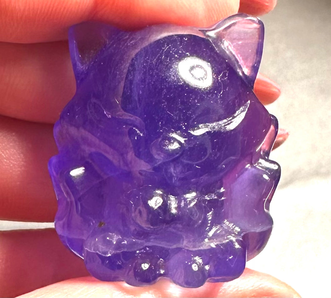 Nine-tailed fox in fluorite