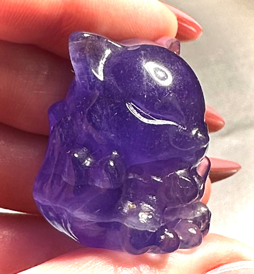 Nine-tailed fox in fluorite