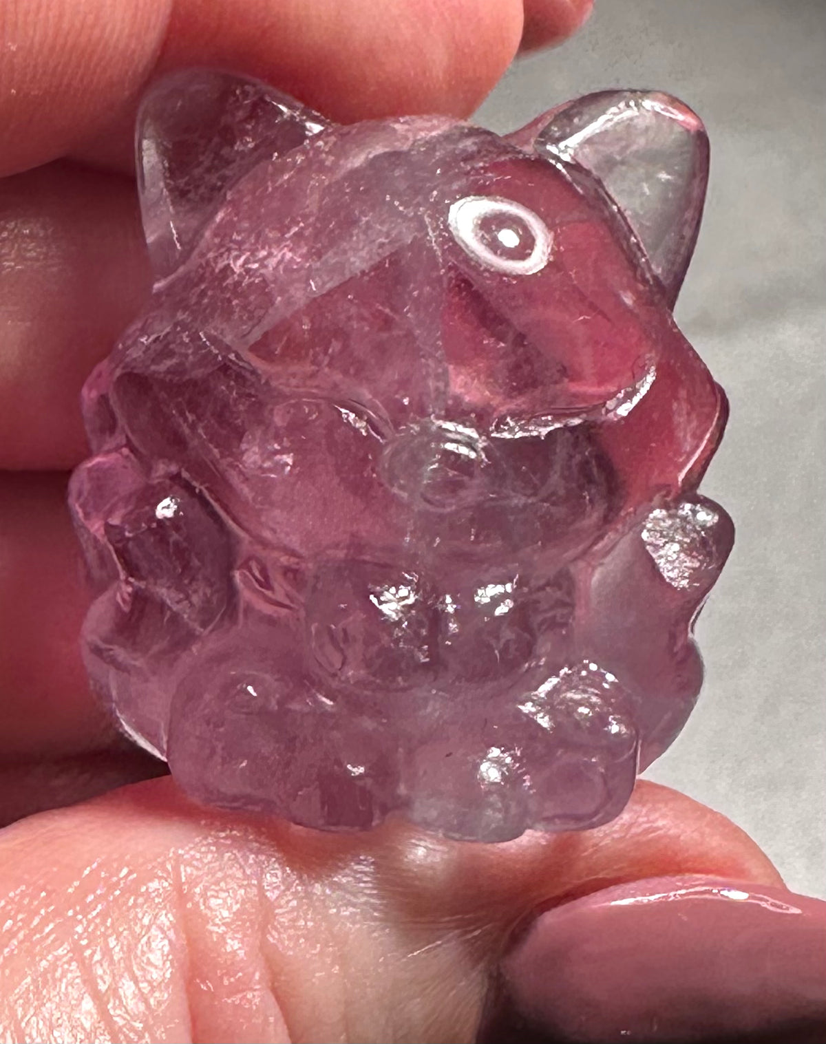 Nine-tailed fox in fluorite