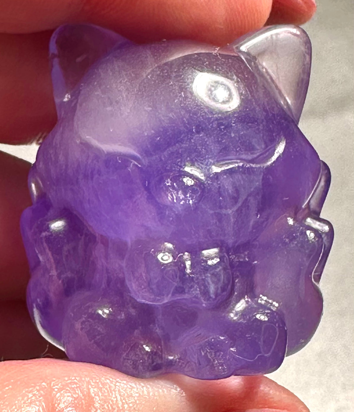 Nine-tailed fox in fluorite