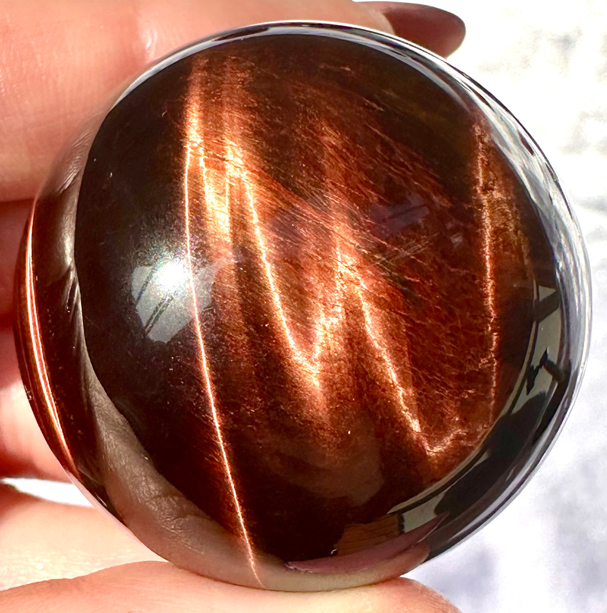 Sphere in red tiger's eye (or bull's eye)