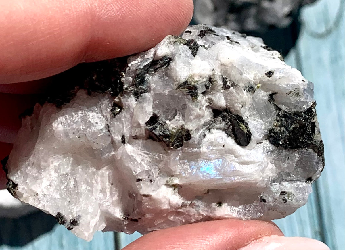 White labradorite with inclusions of raw black tourmaline