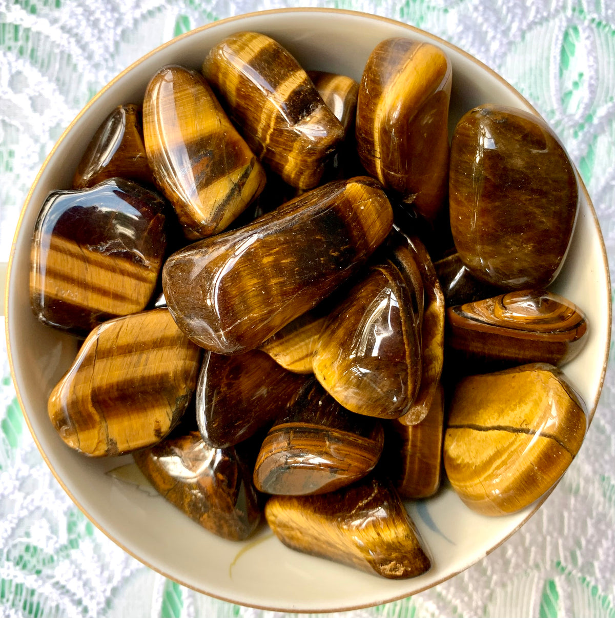 Tiger's eye tumbled stones.